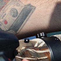 Fotograf mit Tattoo